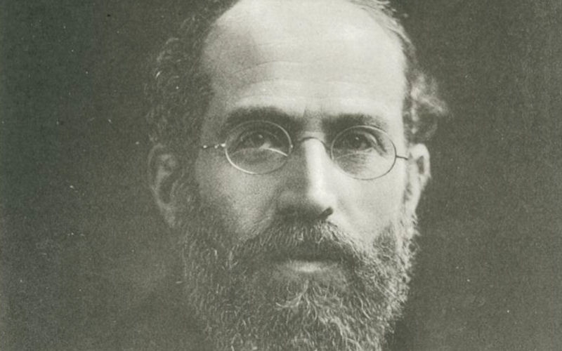 A black and white photograph of Sir Arthur Schuster