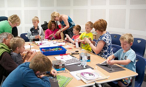 Families taking part in activities at Jodrell Bank Discovery Centre