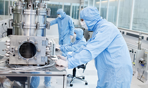 Fellowship researchers preparing graphene samples in NGI's cleanroom