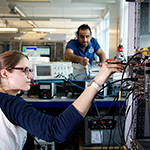A female researcher working in a nuclear physics laboratory