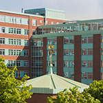 The outside of the Schuster Building, home to particle physics research at the University