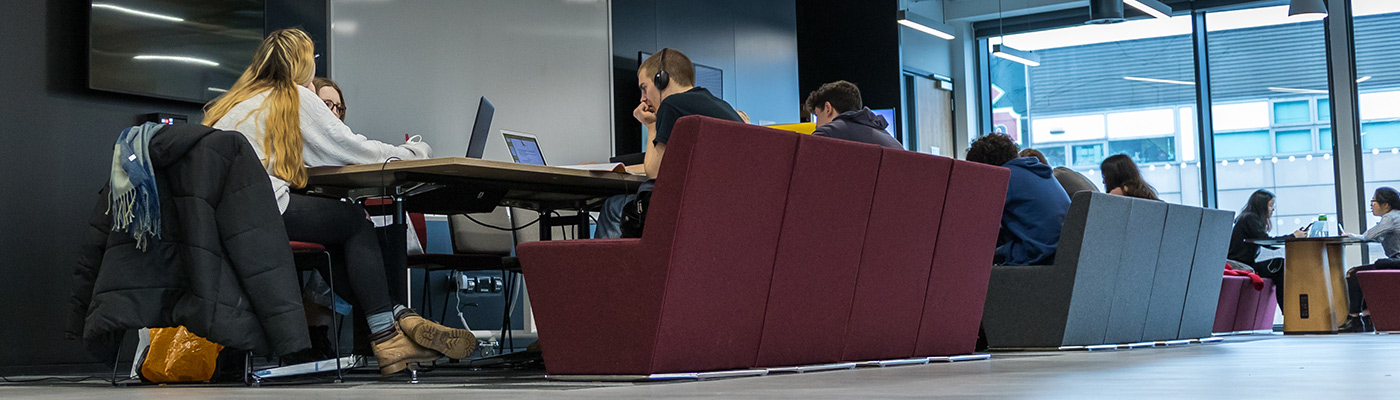 Students working on laptops in Schuster Annexe