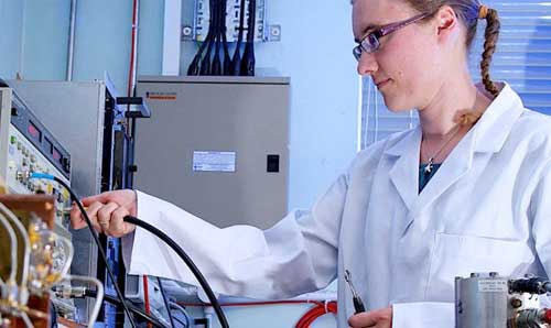 A student working with equipment in a laboratory